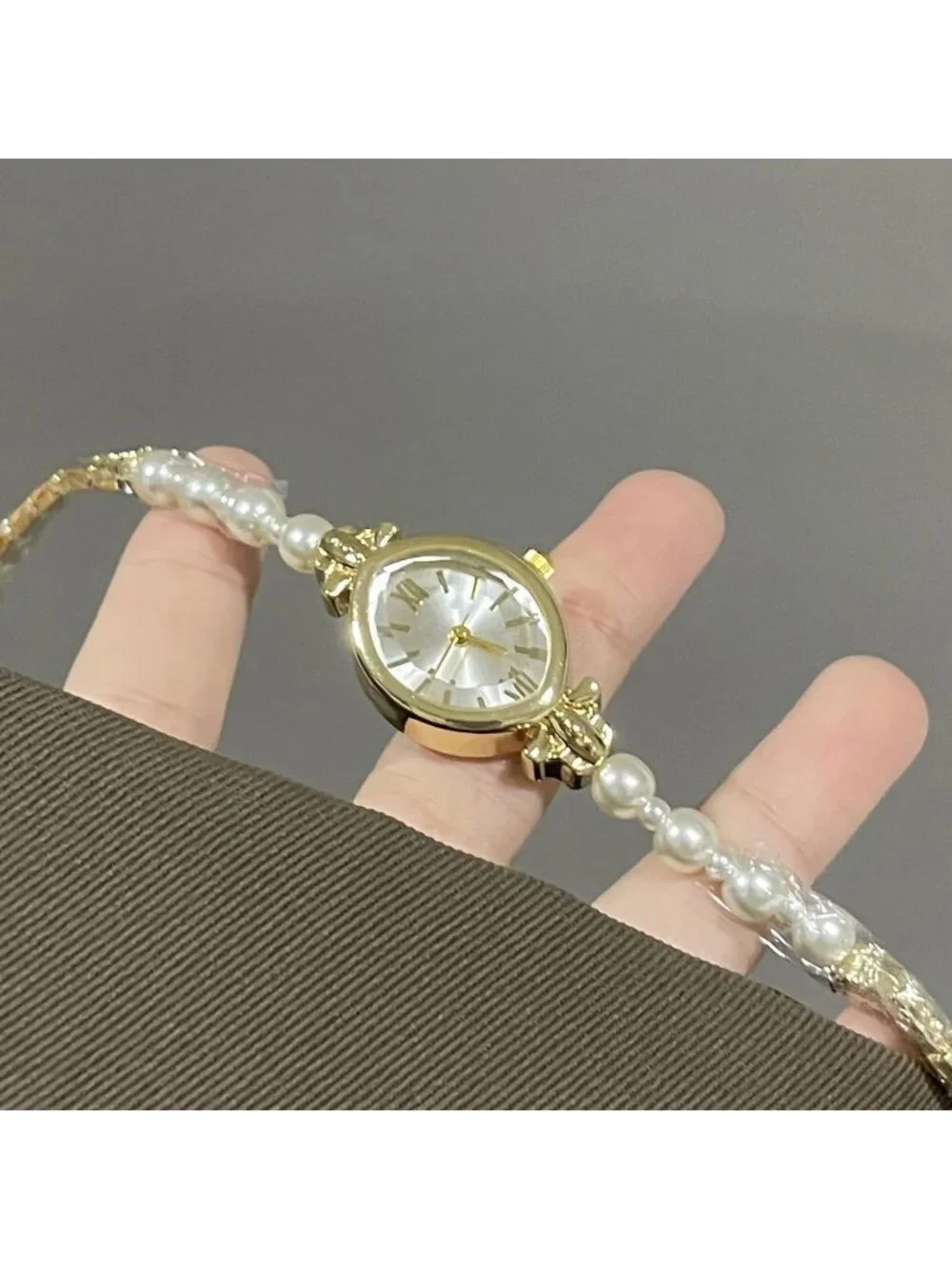 Women's Gold Oval Case Pearl Bracelet Roman Numeral Dial Quartz Wrist Watches